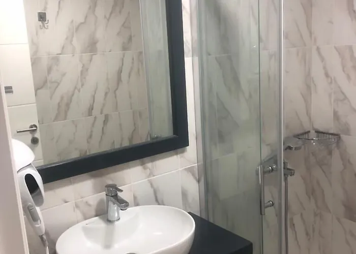 Mi *
